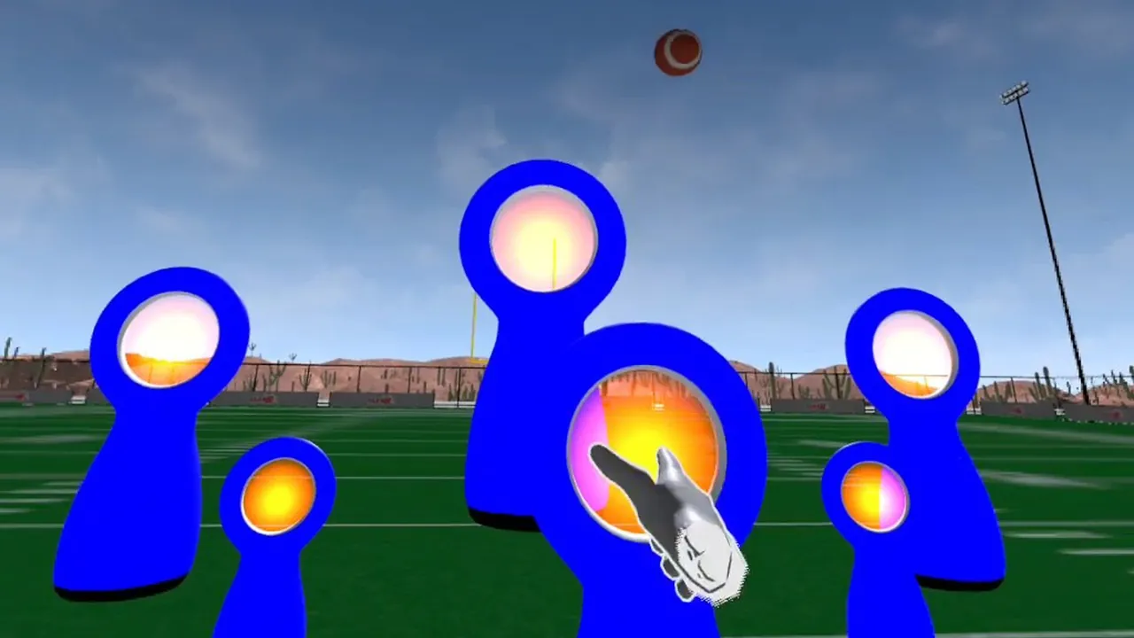 First-person view of blue throwing targets on a football field in Elev8 VR