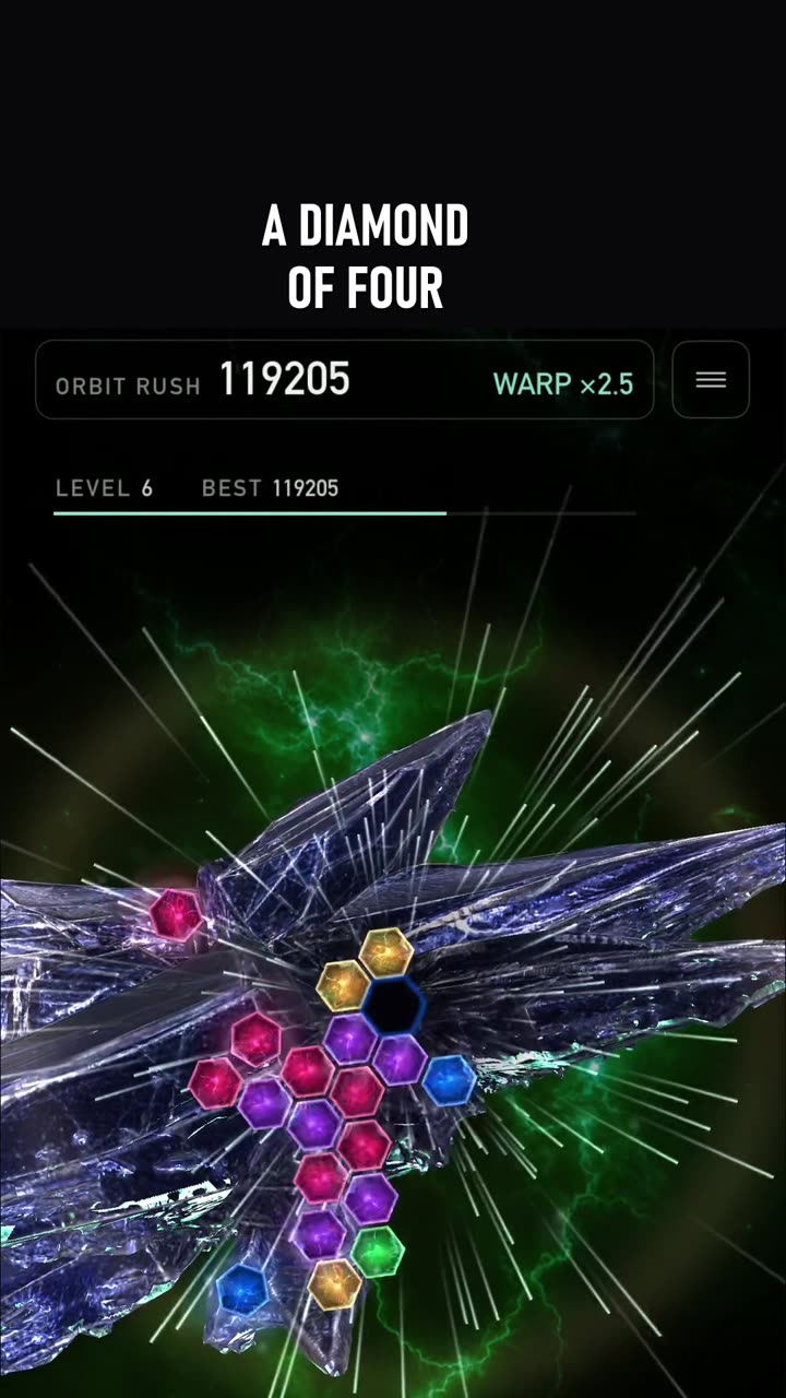Still from the clip: What is the green-ringed piece?
Match a diamond of four and you get a green-ringed piece. Double-tap it and drones strike the pieces nearest the edge first: 12,200 here.