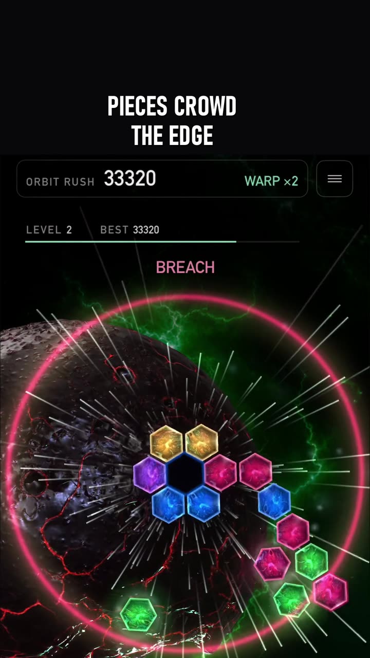 Still from the clip: Can you beat the pink ring?
A pink ring means pieces are crowding the edge, and three there for 1.5 seconds end the run. Here one match took the warning away and the next scored 6,000.